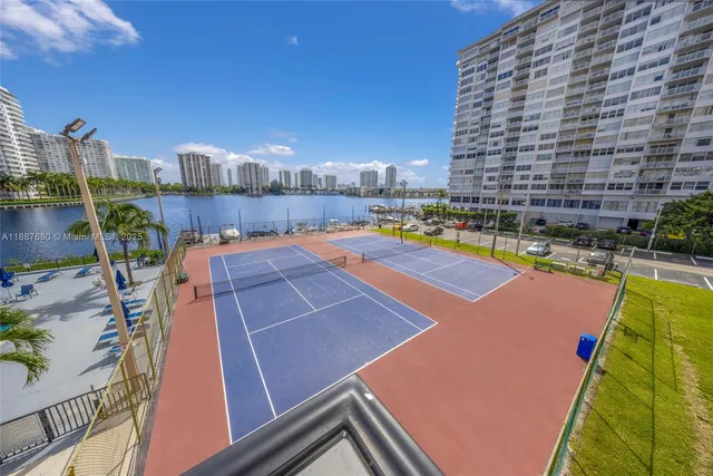 a view of yard with swimming pool and outdoor seating