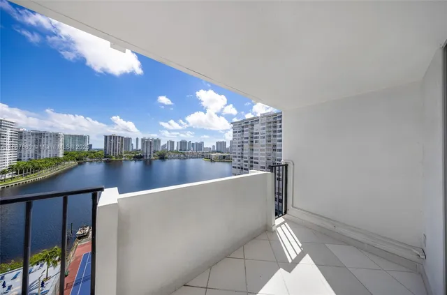 a kitchen with a stove top oven and cabinets