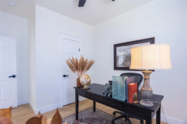 a room with furniture and wooden floor
