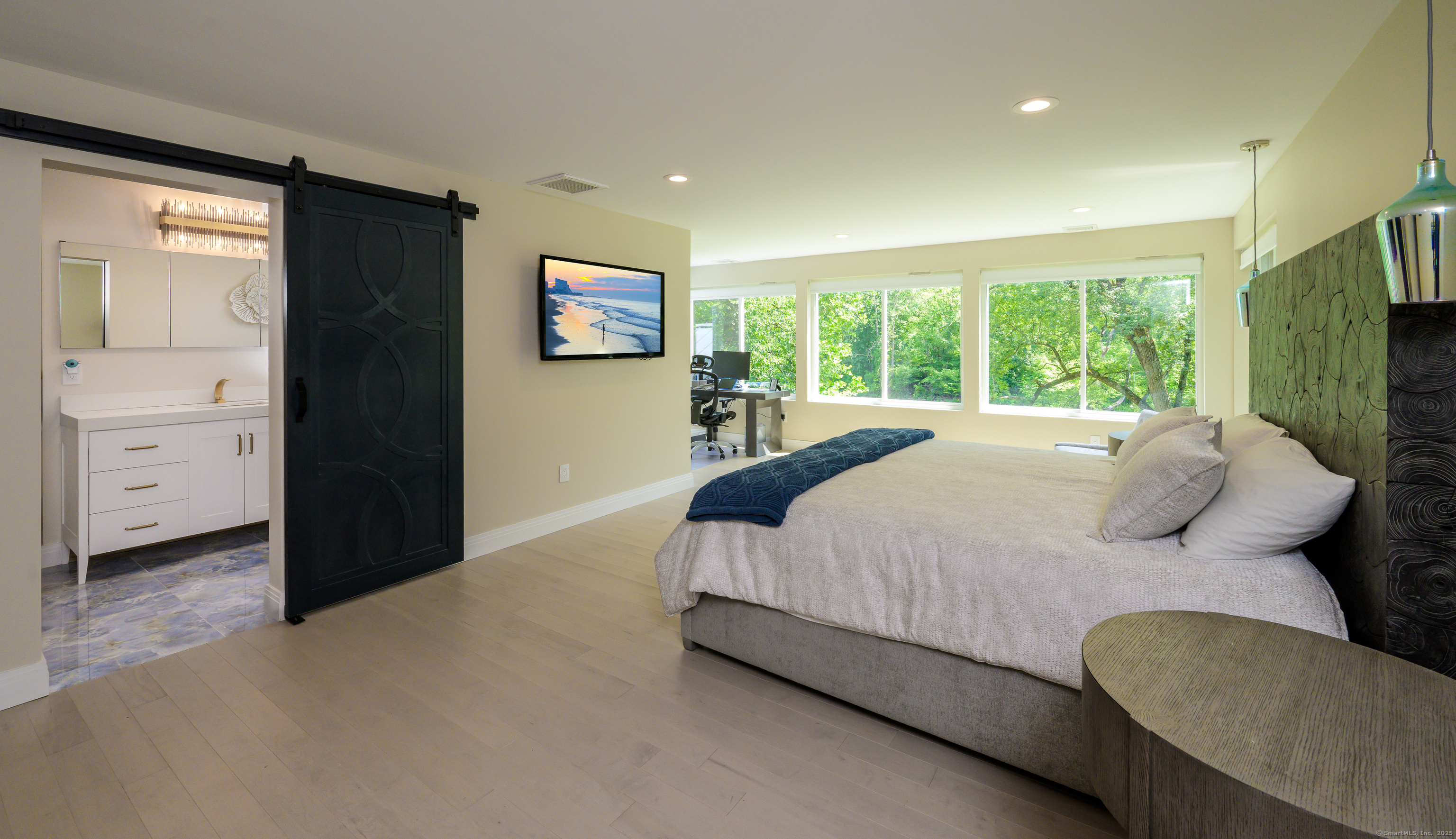 35 Kirk Road Sharon, CT 06796 - Photo 36 of 40 a bedroom with a bed and a large window