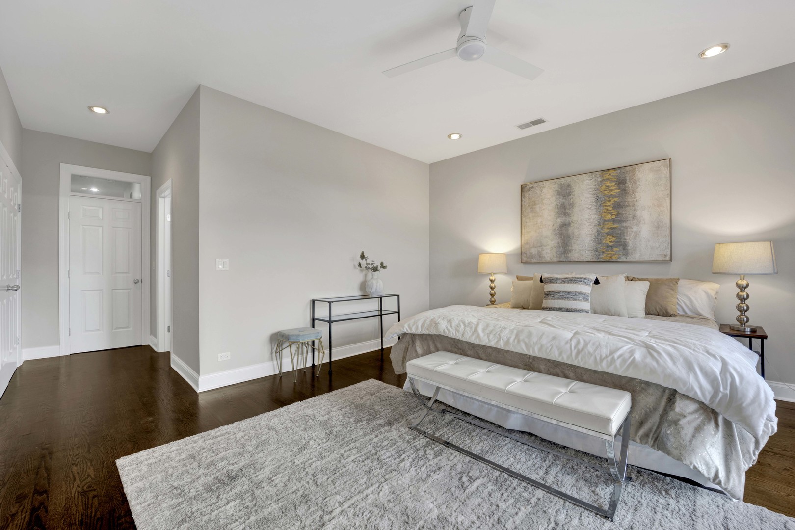 1724 North Mohawk Street, Unit 2 Chicago, IL 60614 - Photo 13 of 24 a bedroom with a bed and wooden floor