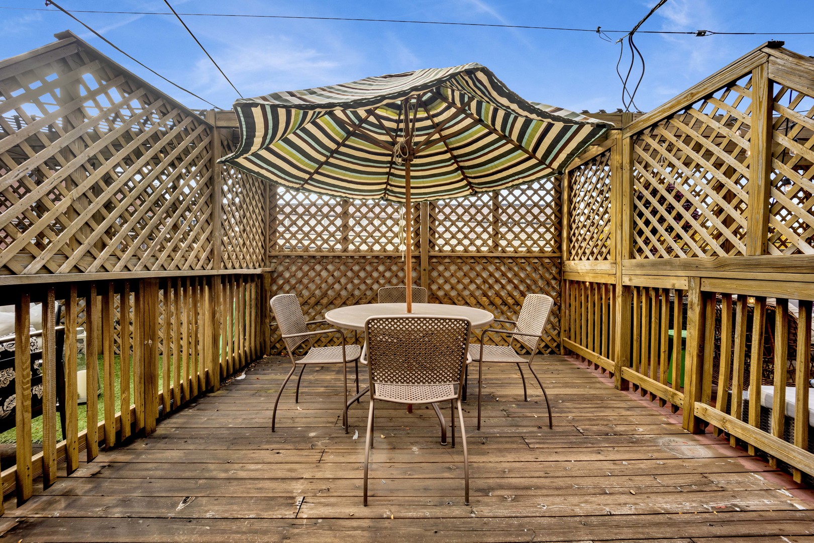 1724 North Mohawk Street, Unit 2 Chicago, IL 60614 - Photo 22 of 24 a view of a balcony with wooden floor