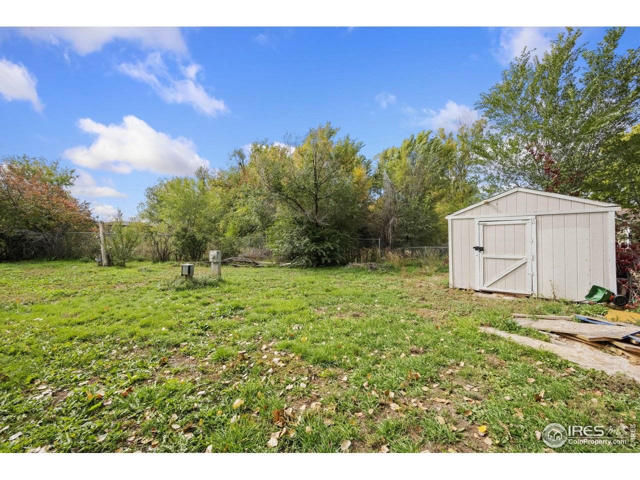 401 North Timberline Road, Unit 142 Fort Collins, CO 80524 - Photo 16 of 16 Huge fenced in backyard!!! with 12 x 11 shed