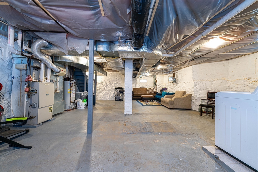 96 Clark Street Everett, MA 02149 - Photo 23 of 26 a view of parking garage with cars