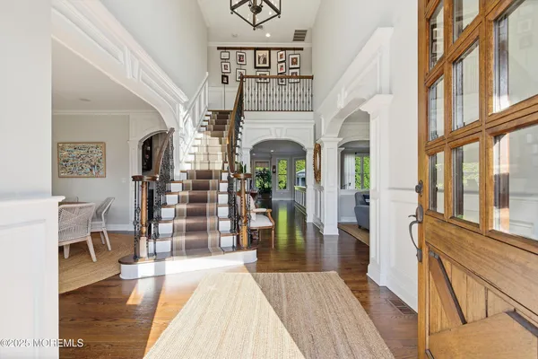 a bedroom with bed and a window