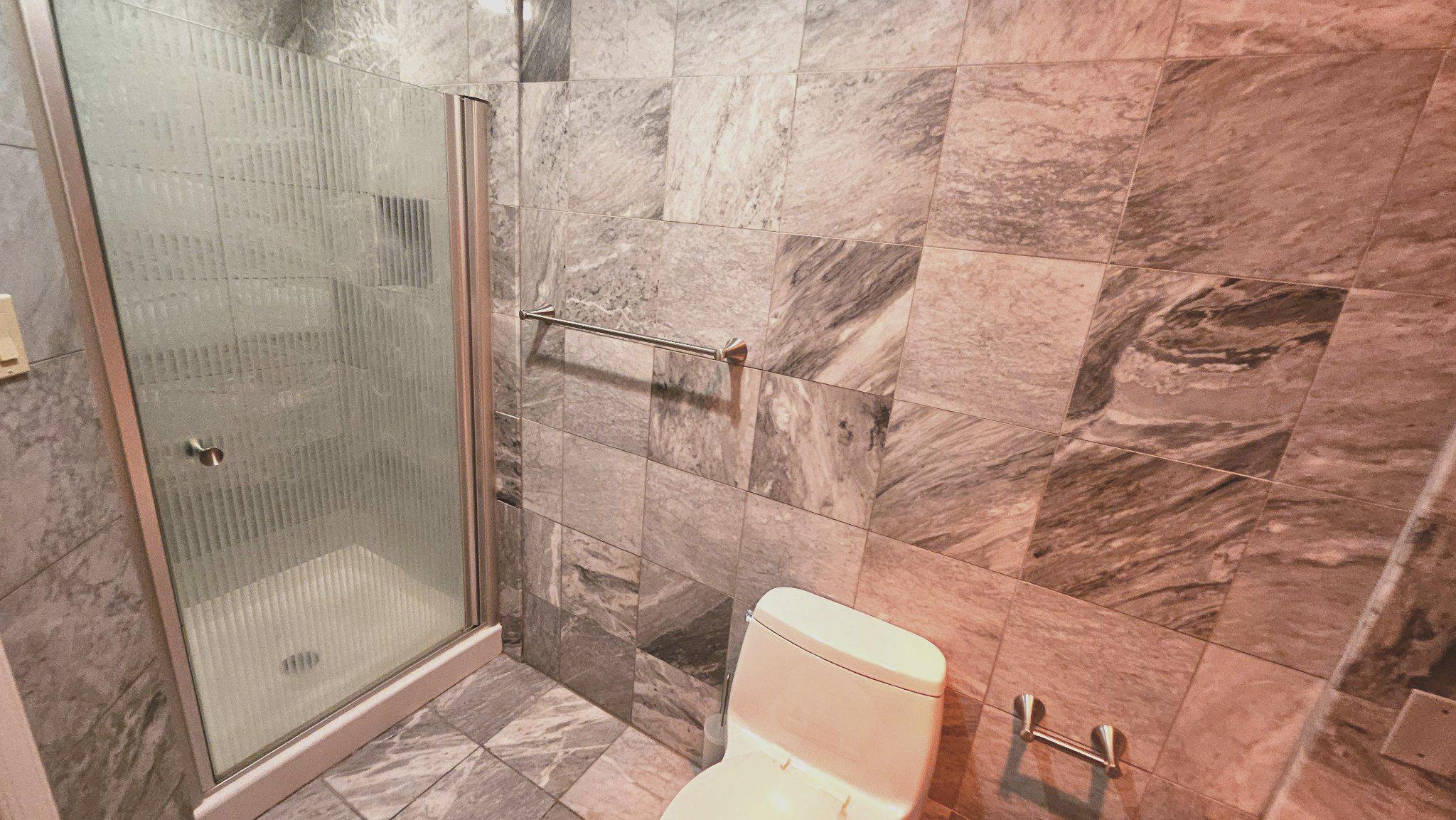 3801 Canterbury Road, Unit 703 Baltimore, MD 21218 - Photo 14 of 32 Primary Bathroom - Marble Walls & Floor