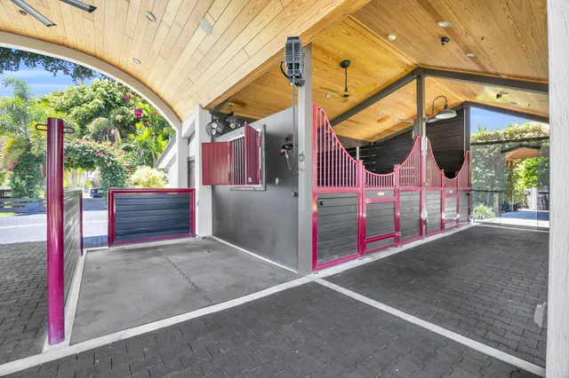 a kitchen with a table and chairs