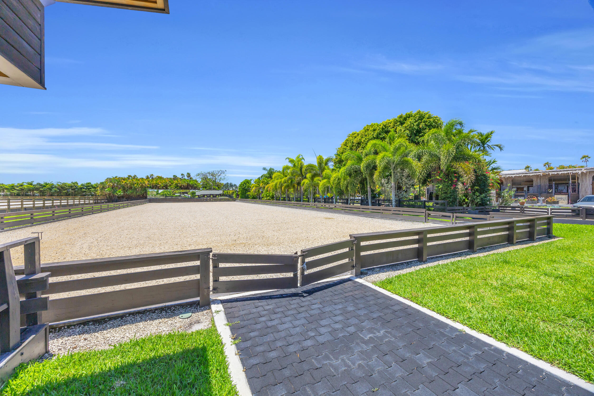 12880 Indian Mound Road Wellington, FL 33449 - Photo 28 of 43 a view of a bench in a backyard