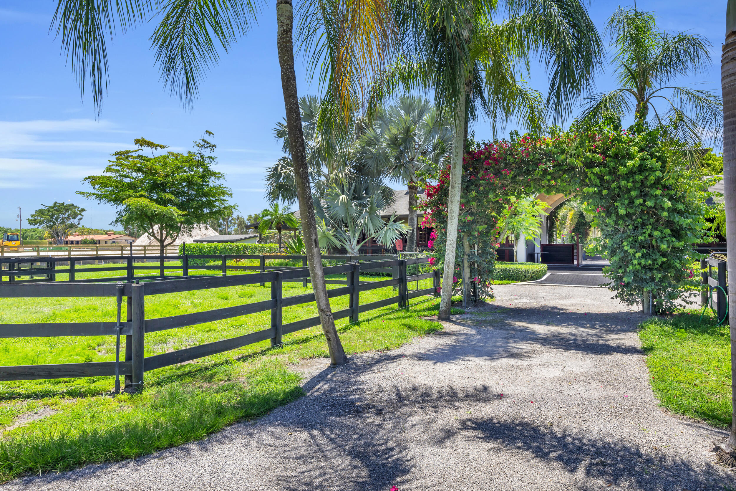 12880 Indian Mound Road Wellington, FL 33449 - Photo 3 of 43 a view of a park with palm trees