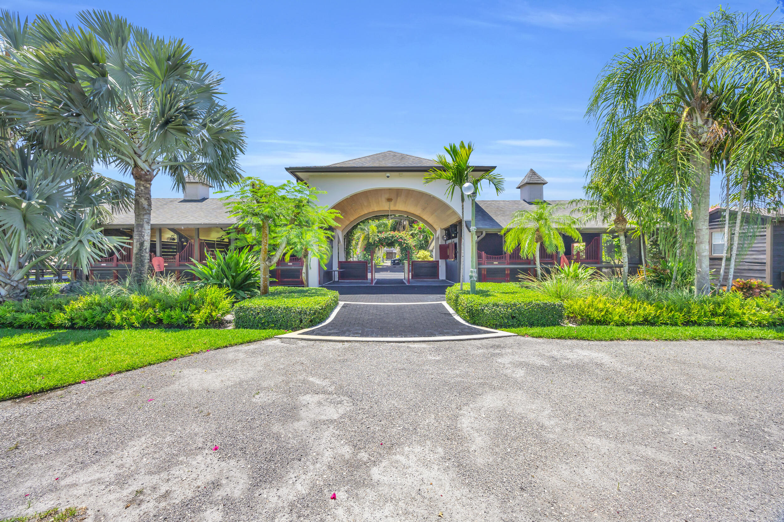 12880 Indian Mound Road Wellington, FL 33449 - Photo 5 of 43 a view of a garden with a slide