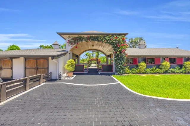 a view of a house with a swimming pool