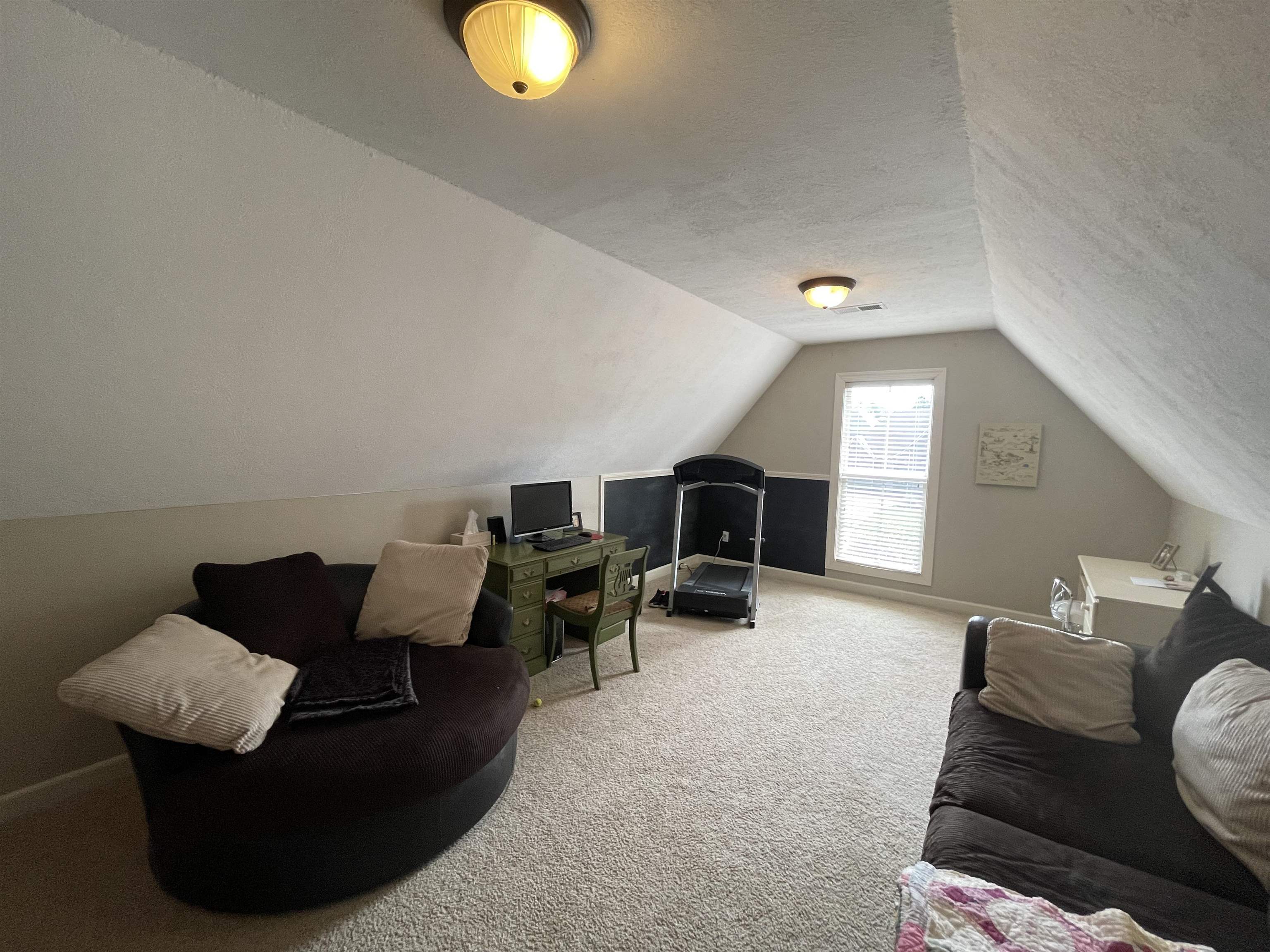 17 Flagstone Drive Jackson, TN 38305 - Photo 15 of 16 a living room with furniture and a fireplace