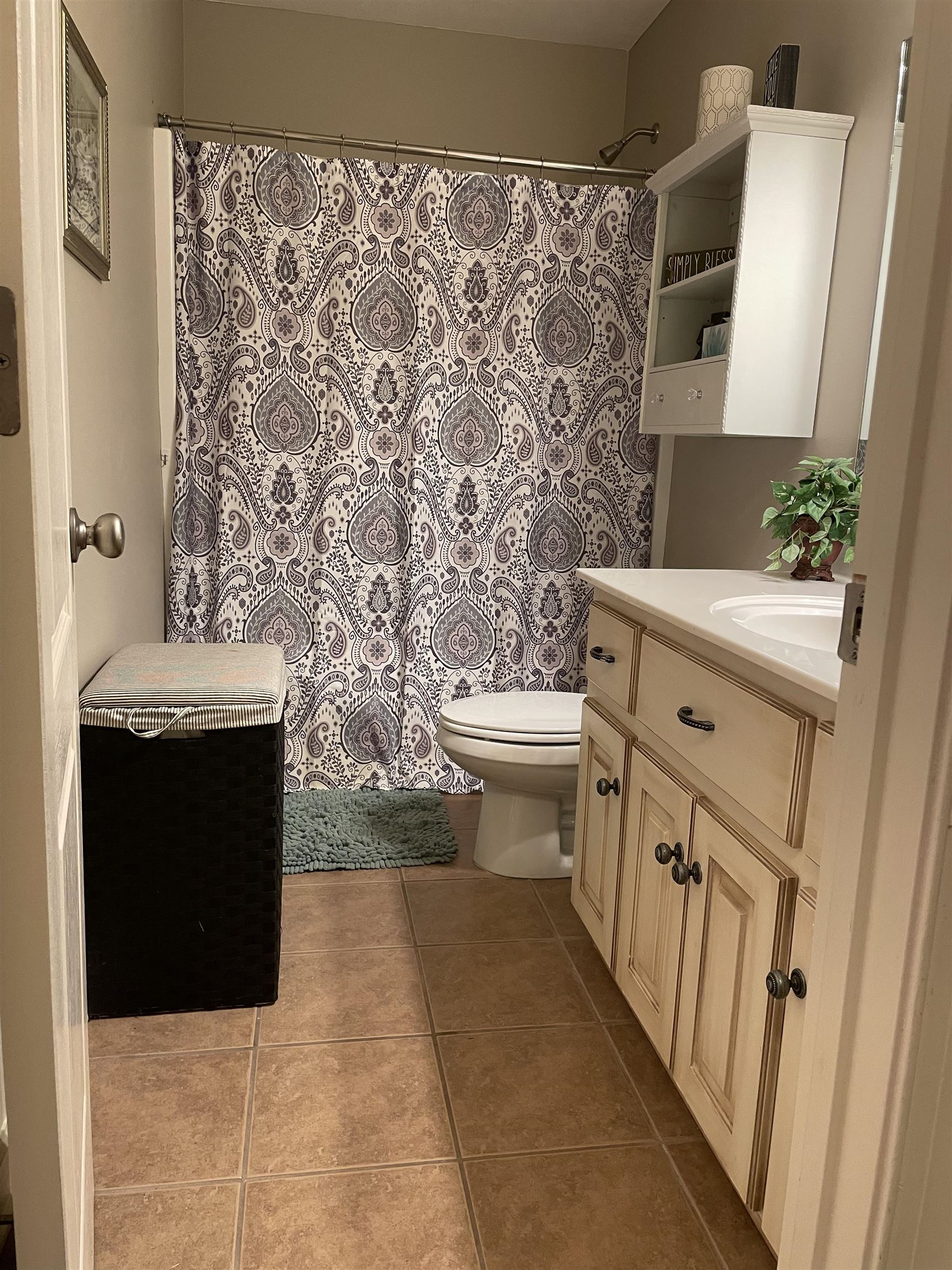 17 Flagstone Drive Jackson, TN 38305 - Photo 16 of 16 a bathroom with a toilet and a sink