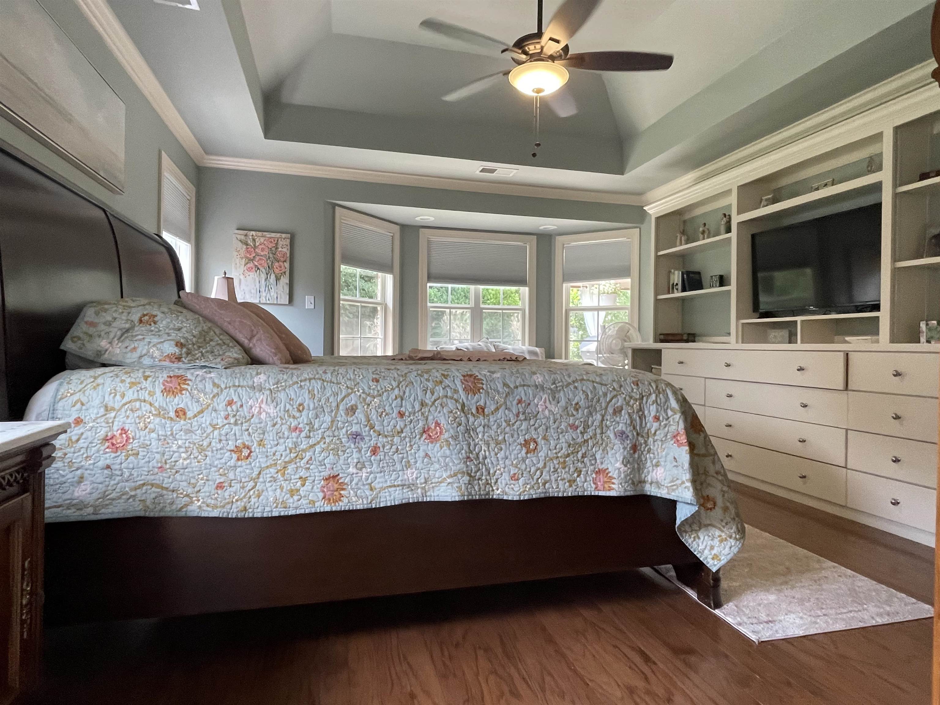 17 Flagstone Drive Jackson, TN 38305 - Photo 10 of 16 a bed sitting in a bedroom next to a window