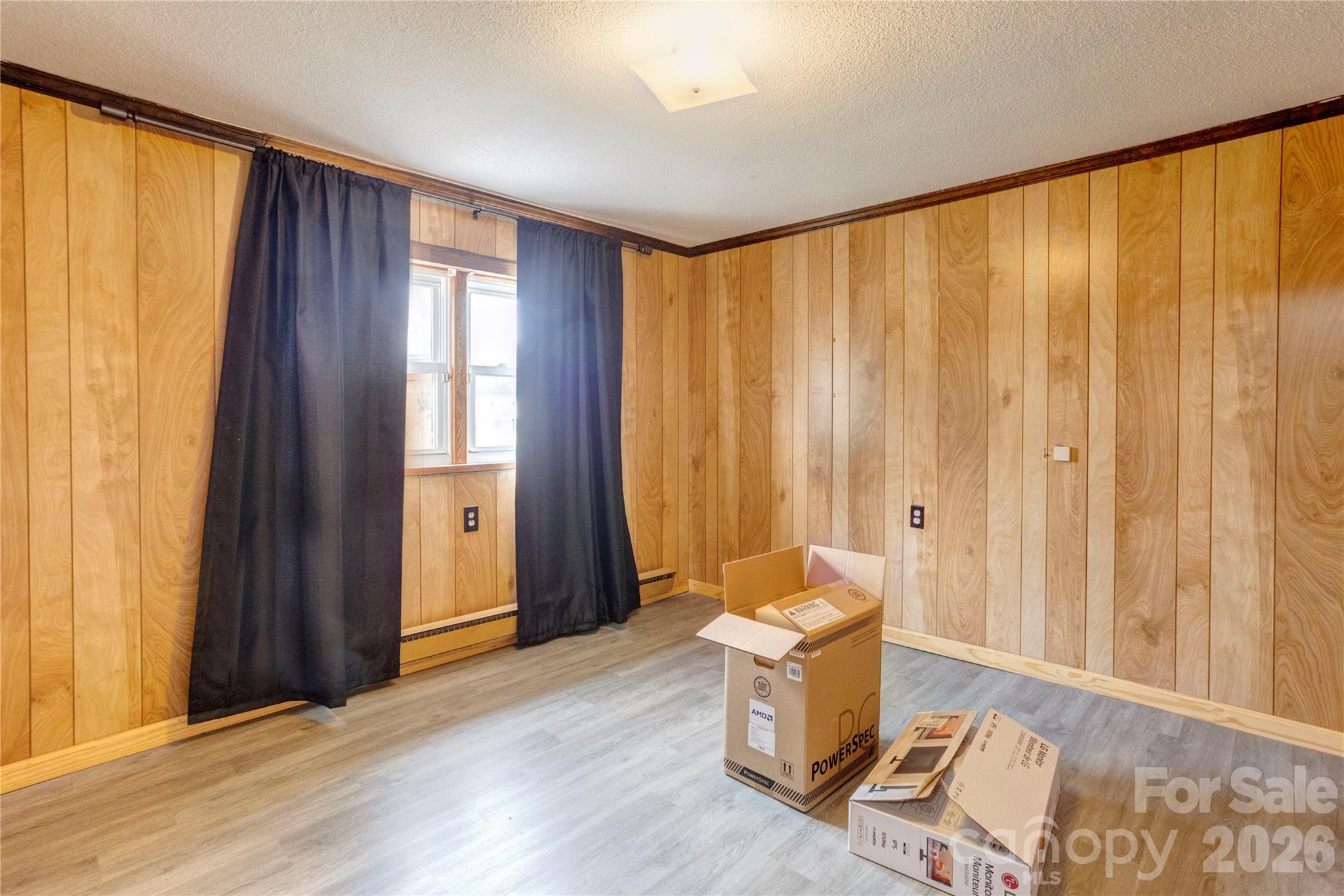 455 Rimer Road Salisbury, NC 28146 - Photo 14 of 22 a living room with a window and a wooden floor