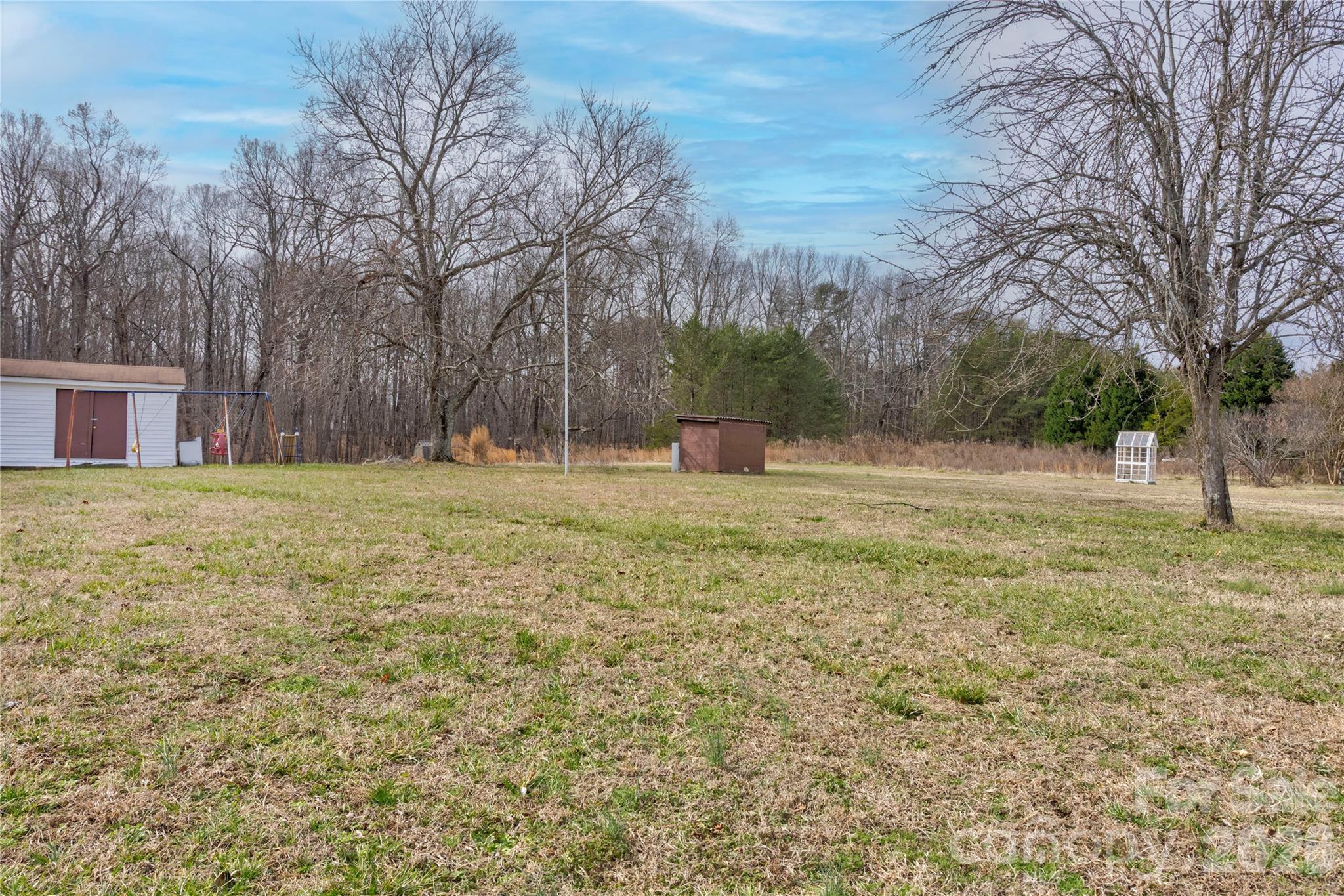 455 Rimer Road Salisbury, NC 28146 - Photo 19 of 22 a backyard of a house with lots of green space