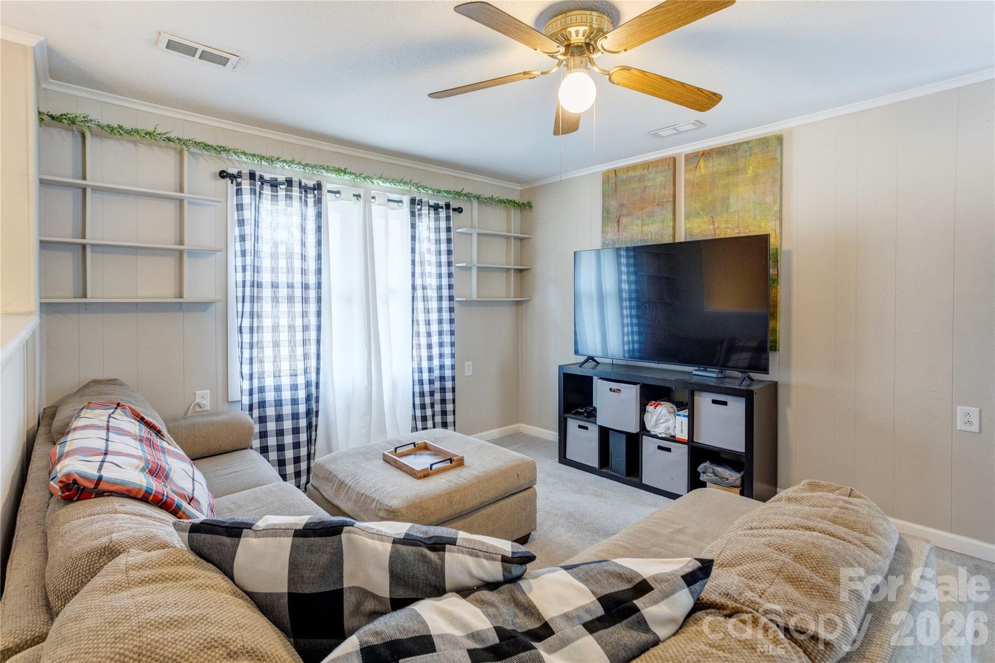 455 Rimer Road Salisbury, NC 28146 - Photo 3 of 22 a bedroom with a bed and a flat screen tv
