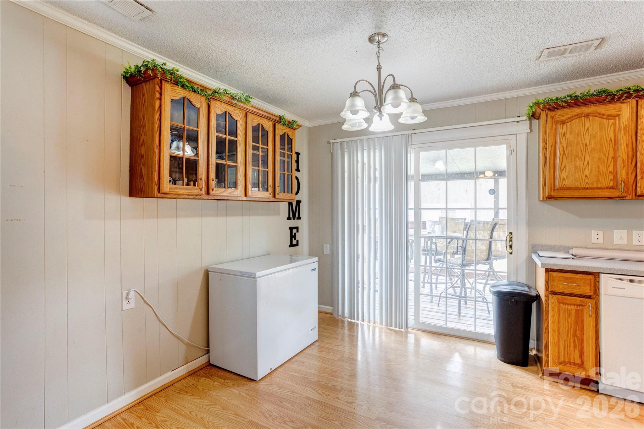 455 Rimer Road Salisbury, NC 28146 - Photo 6 of 22 a view of a big room with wooden floor and windows