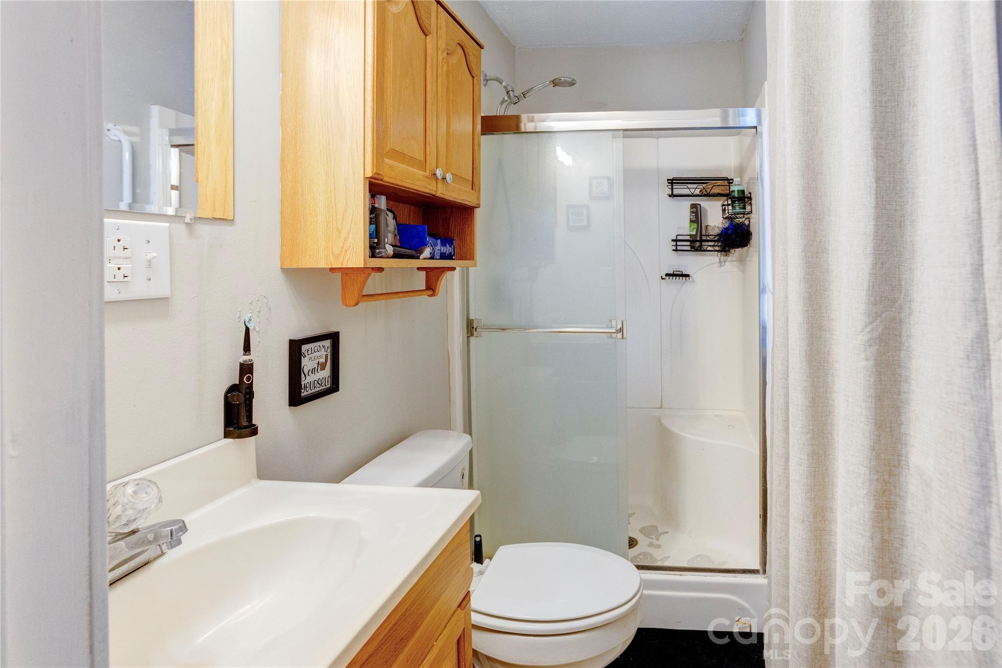 455 Rimer Road Salisbury, NC 28146 - Photo 8 of 22 a bathroom with a sink toilet and shower