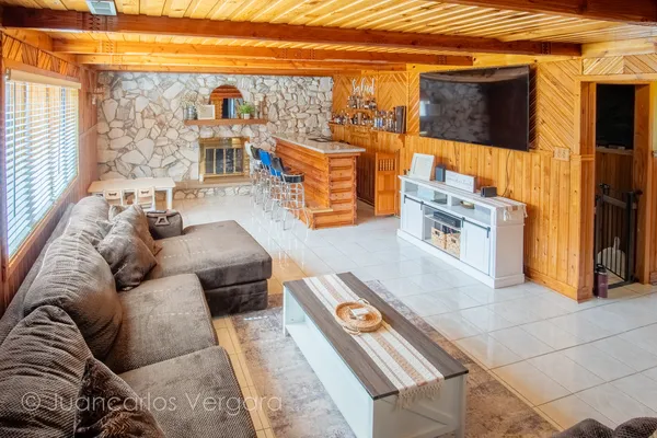 a kitchen with stainless steel appliances granite countertop a stove and a refrigerator