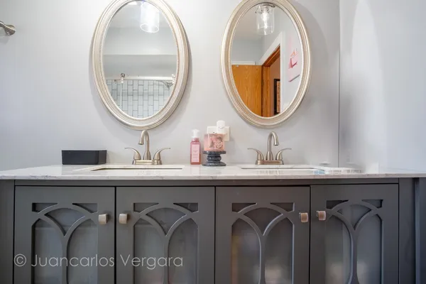 a bathroom with a sink a toilet and a tub