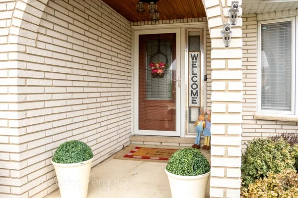 a kitchen with granite countertop lots of counter top space appliances and cabinets
