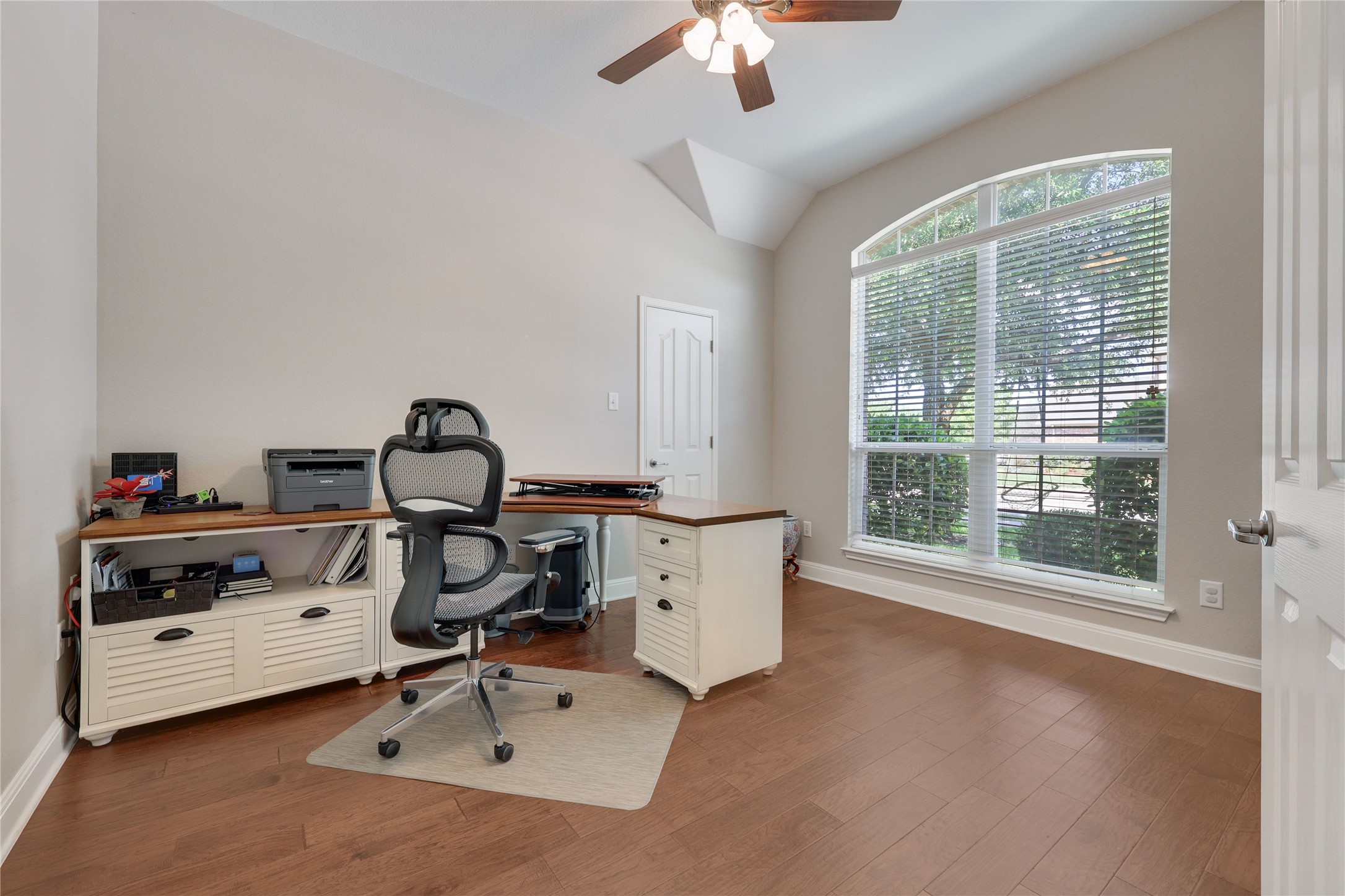 433 Ridgetop Bend Cedar Park, TX 78613 - Photo 17 of 34 Office space featuring ceiling fan, dark wood-type flooring, and vaulted ceiling