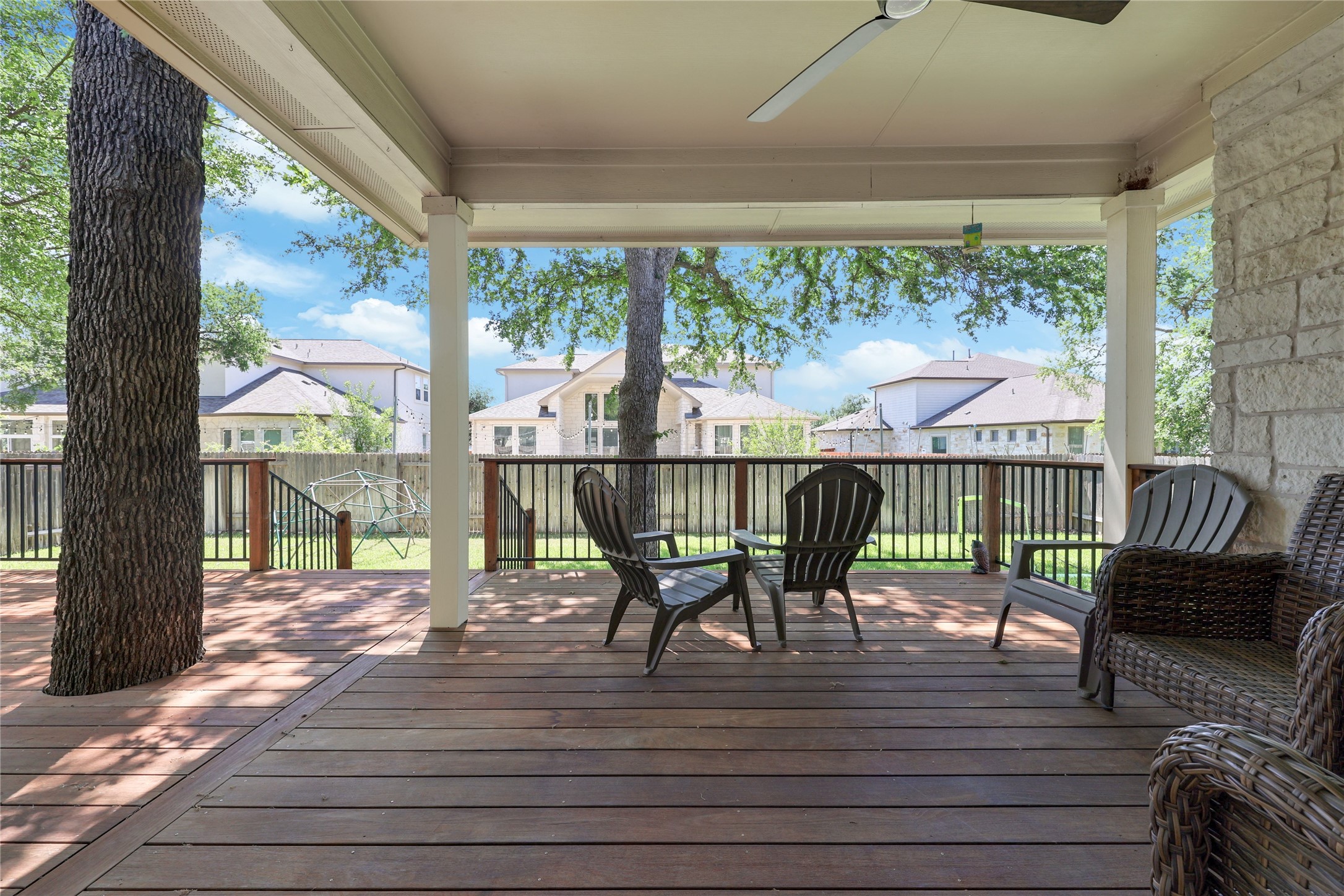 433 Ridgetop Bend Cedar Park, TX 78613 - Photo 24 of 34 Deck featuring a ceiling fan and a residential view