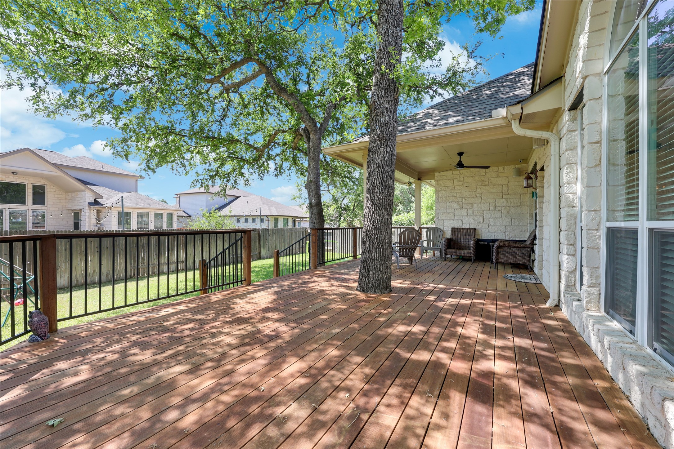433 Ridgetop Bend Cedar Park, TX 78613 - Photo 25 of 34 Deck featuring ceiling fan and a residential view