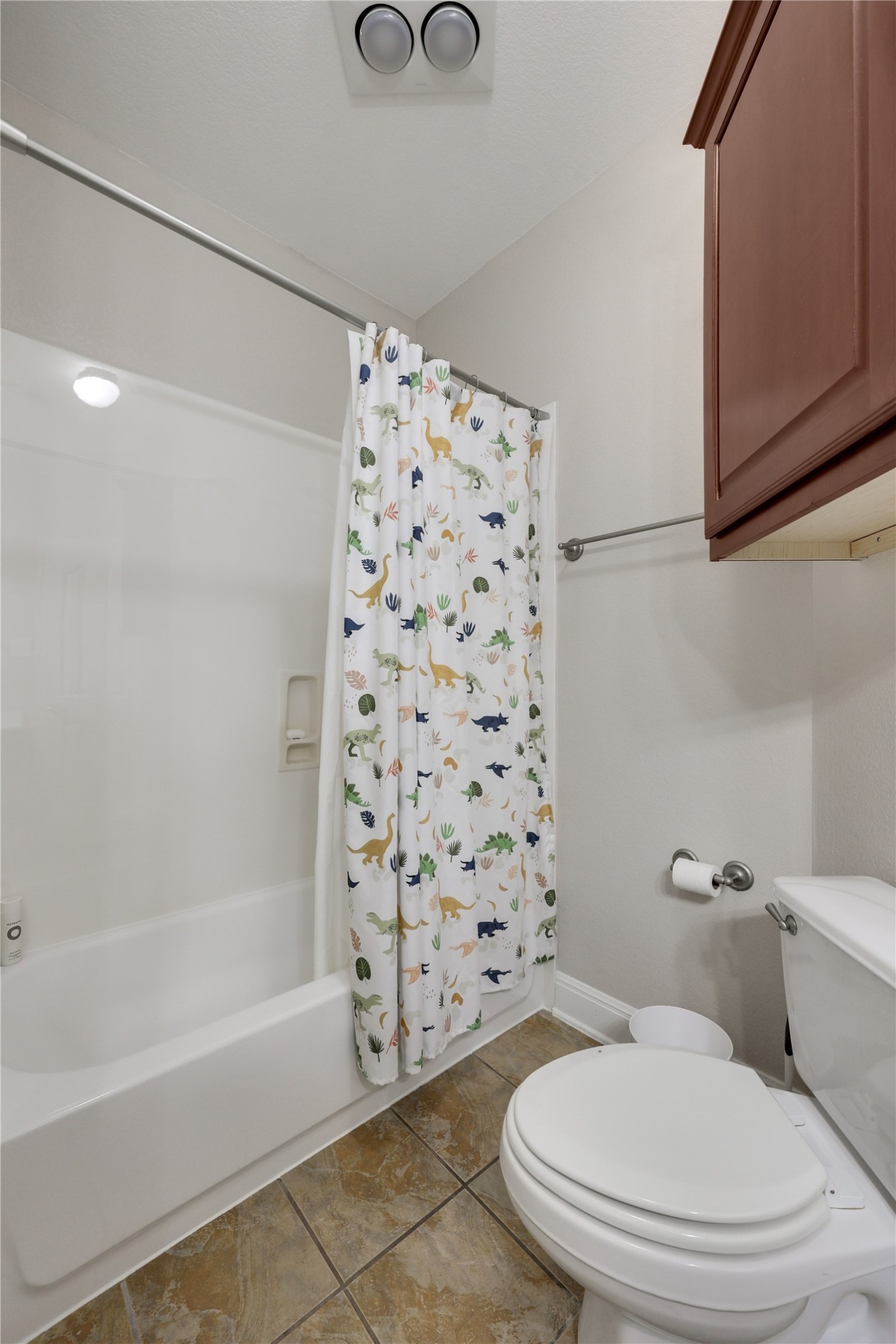 433 Ridgetop Bend Cedar Park, TX 78613 - Photo 34 of 34 Bathroom with shower / bath combo and light tile patterned flooring
