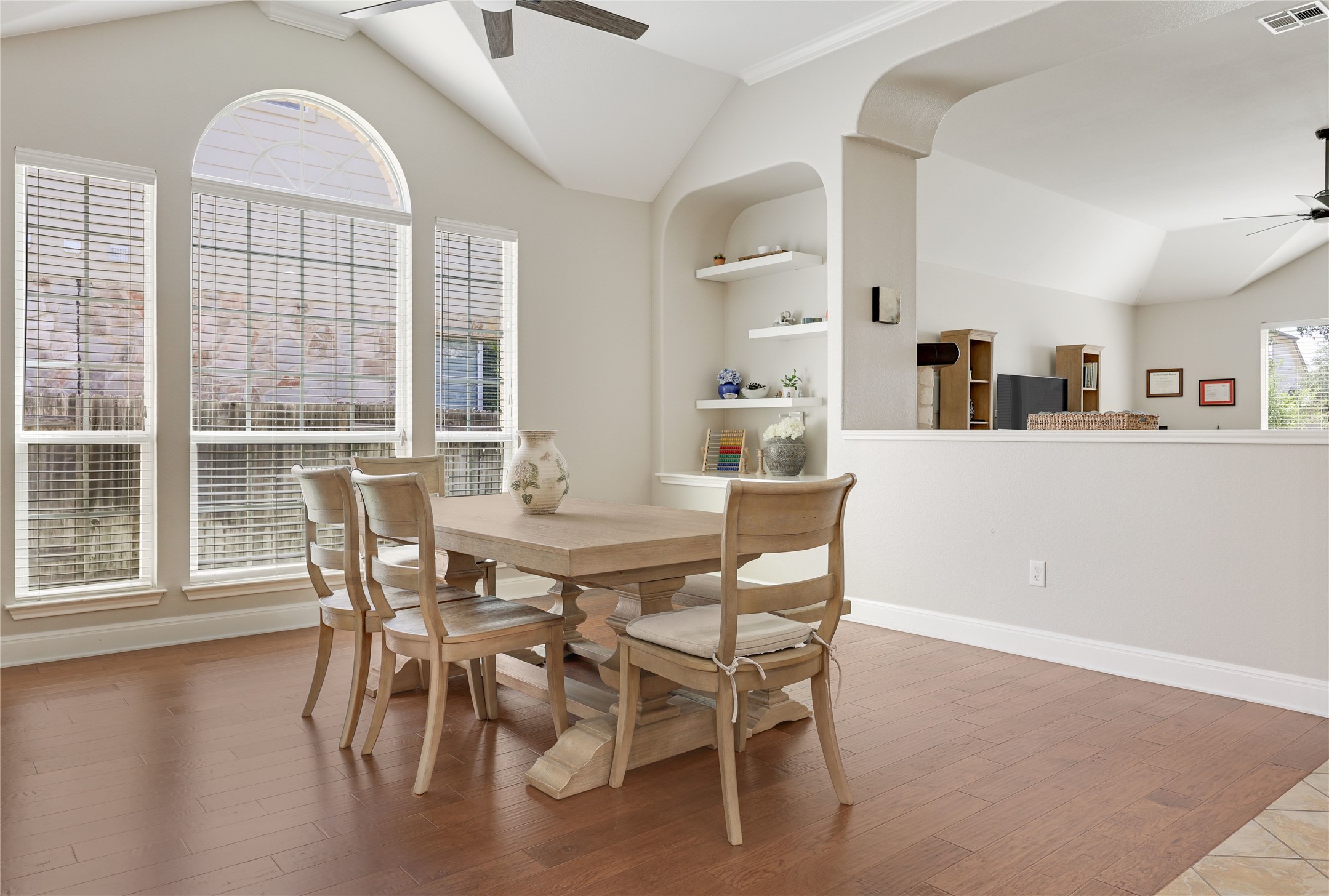 433 Ridgetop Bend Cedar Park, TX 78613 - Photo 9 of 34 Dining space with ceiling fan, built in features, and wood finished floors