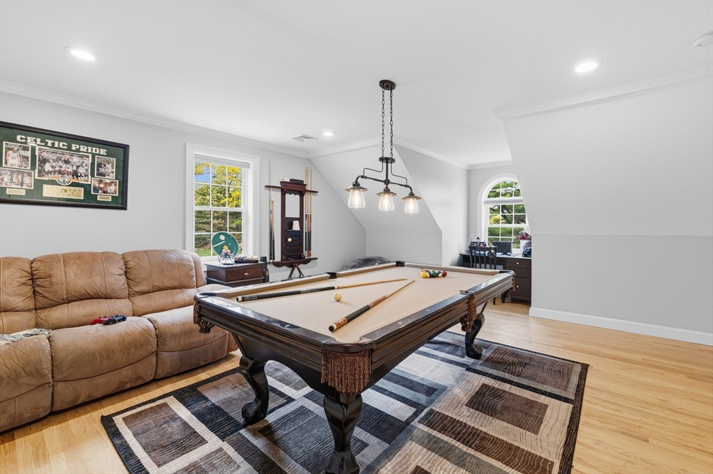 35 High Street Freetown, MA 02702 - Photo 32 of 40 a living room with a table and a window