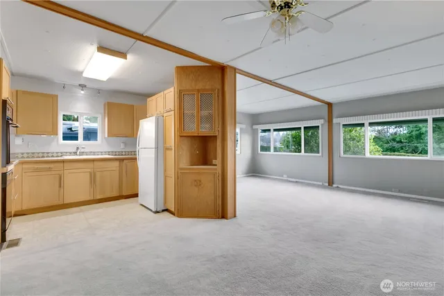 a view of a kitchen with a sink cabinets and a kitchen
