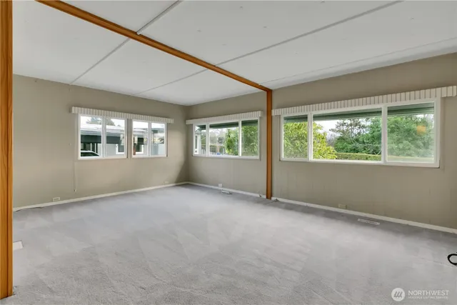 an empty room with windows