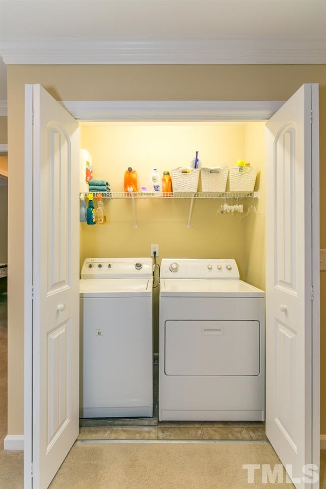 4607 Altha Street Raleigh, NC 27606 - Photo 15 of 23 a utility room with dryer and washer