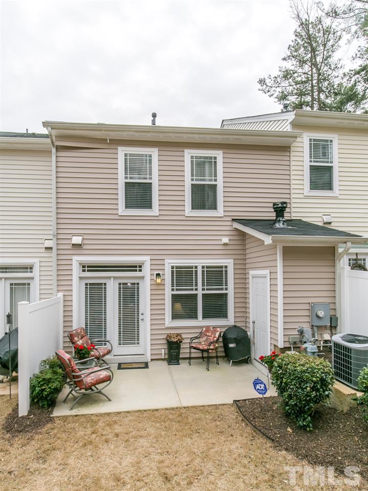 4607 Altha Street Raleigh, NC 27606 - Photo 16 of 23 a view of a house with a patio