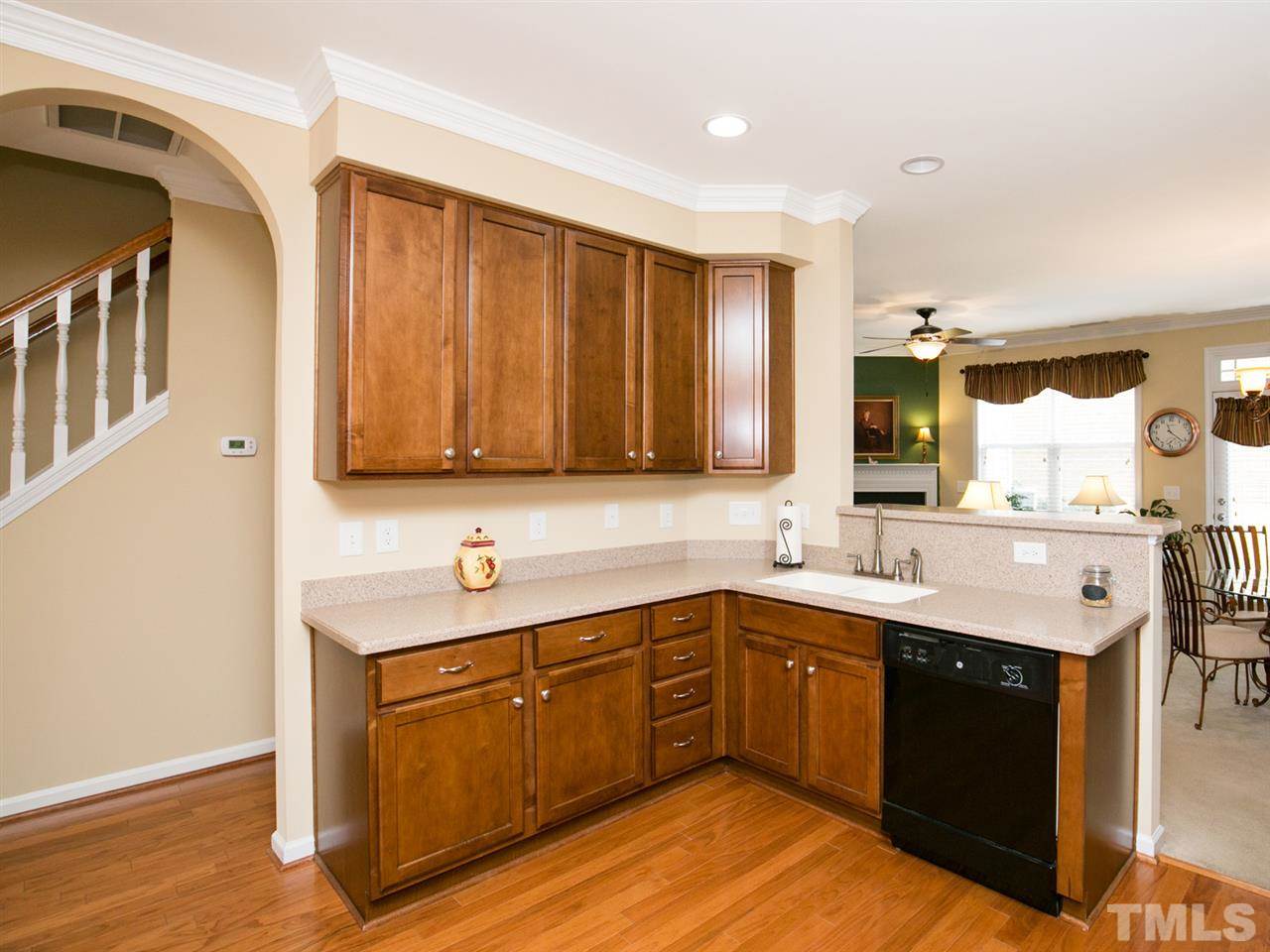 4607 Altha Street Raleigh, NC 27606 - Photo 3 of 23 a kitchen with a sink cabinets and appliances