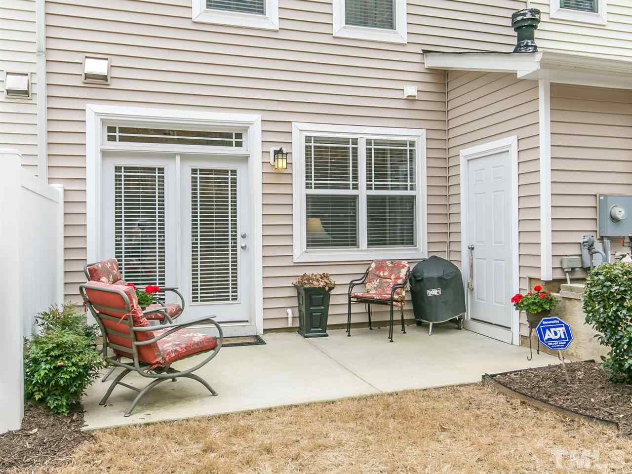4607 Altha Street Raleigh, NC 27606 - Photo 7 of 23 a backyard of a house with outdoor seating