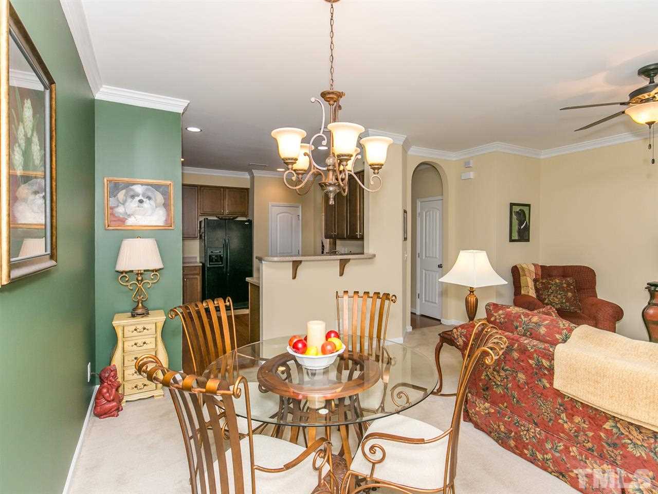 4607 Altha Street Raleigh, NC 27606 - Photo 8 of 23 a dining room with furniture and window
