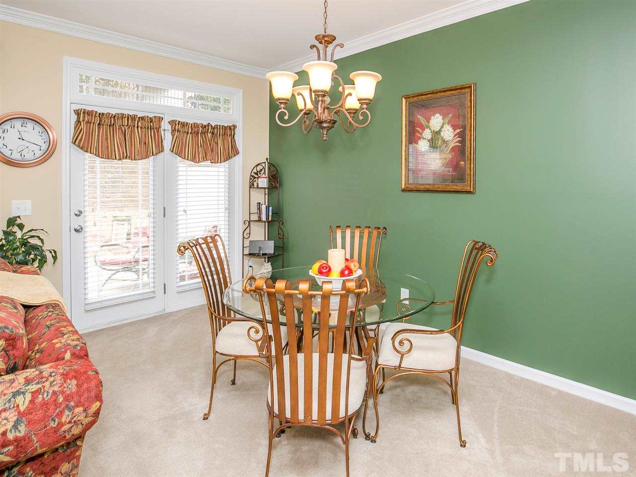 4607 Altha Street Raleigh, NC 27606 - Photo 10 of 23 a dining room with furniture and window