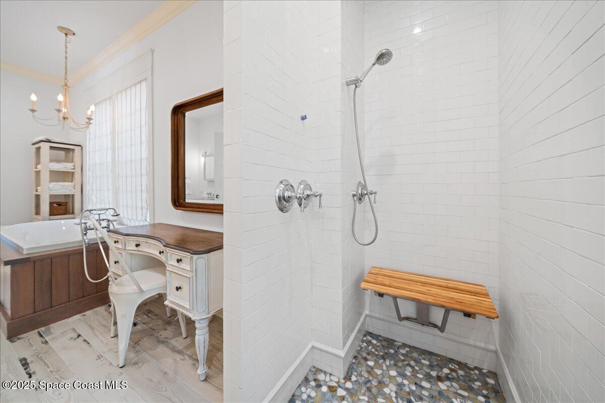 11 Mitchell Street Cocoa, FL 32922 - Photo 49 of 132 a bathroom with a sink toilet a mirror and shower