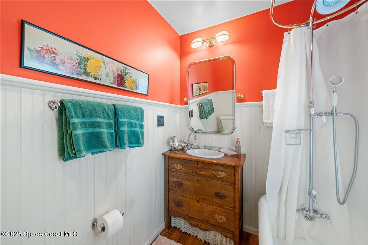 11 Mitchell Street Cocoa, FL 32922 - Photo 93 of 132 a bathroom with a sink toilet and shower