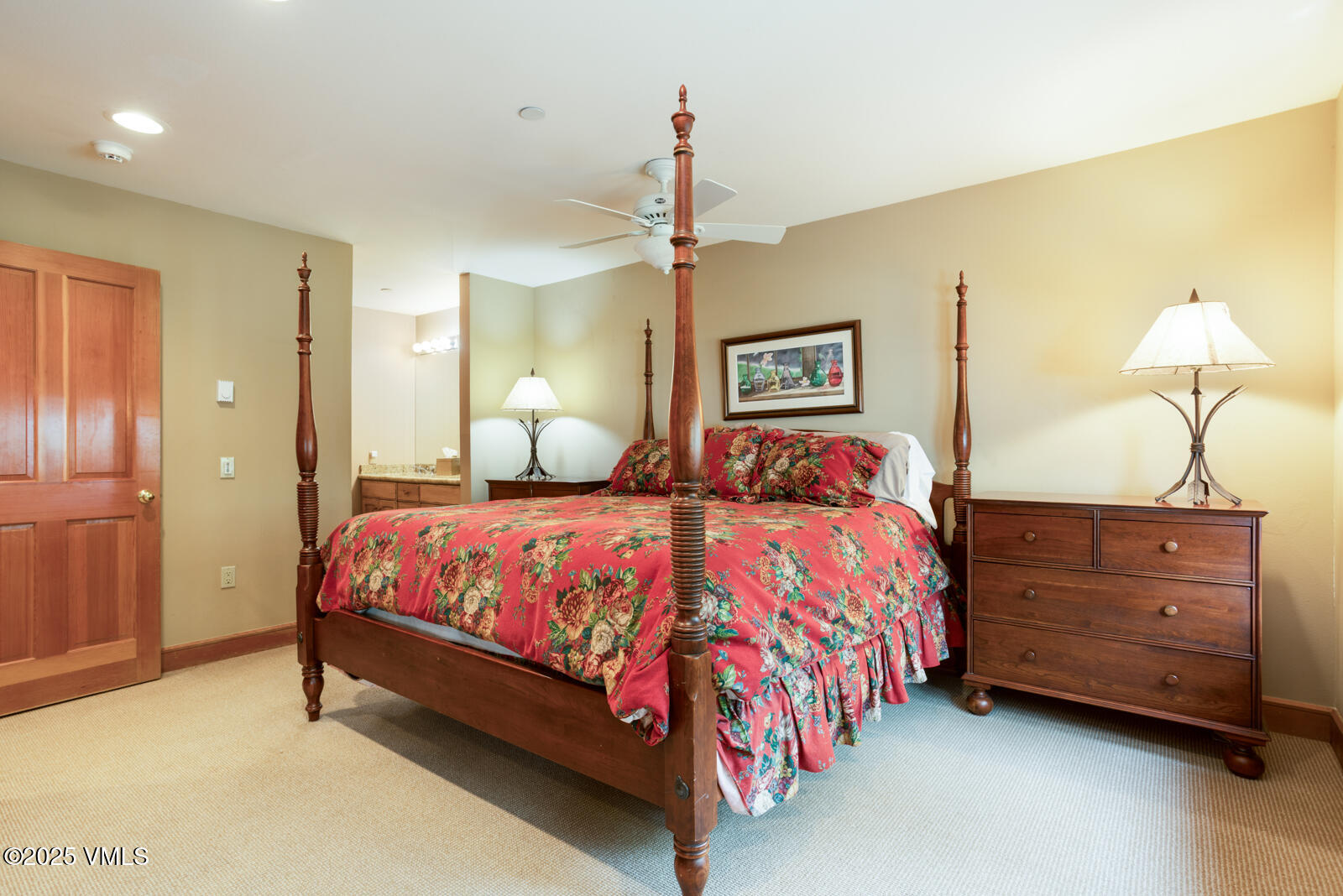 380 Offerson Road, Unit K2 Beaver Creek, CO 81620 - Photo 16 of 40 a bedroom with a bed and a chandelier