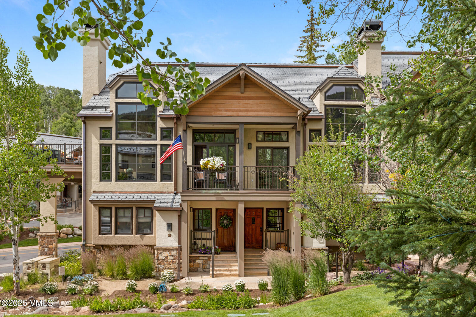 380 Offerson Road, Unit K2 Beaver Creek, CO 81620 - Photo 2 of 40 front view of house with a yard