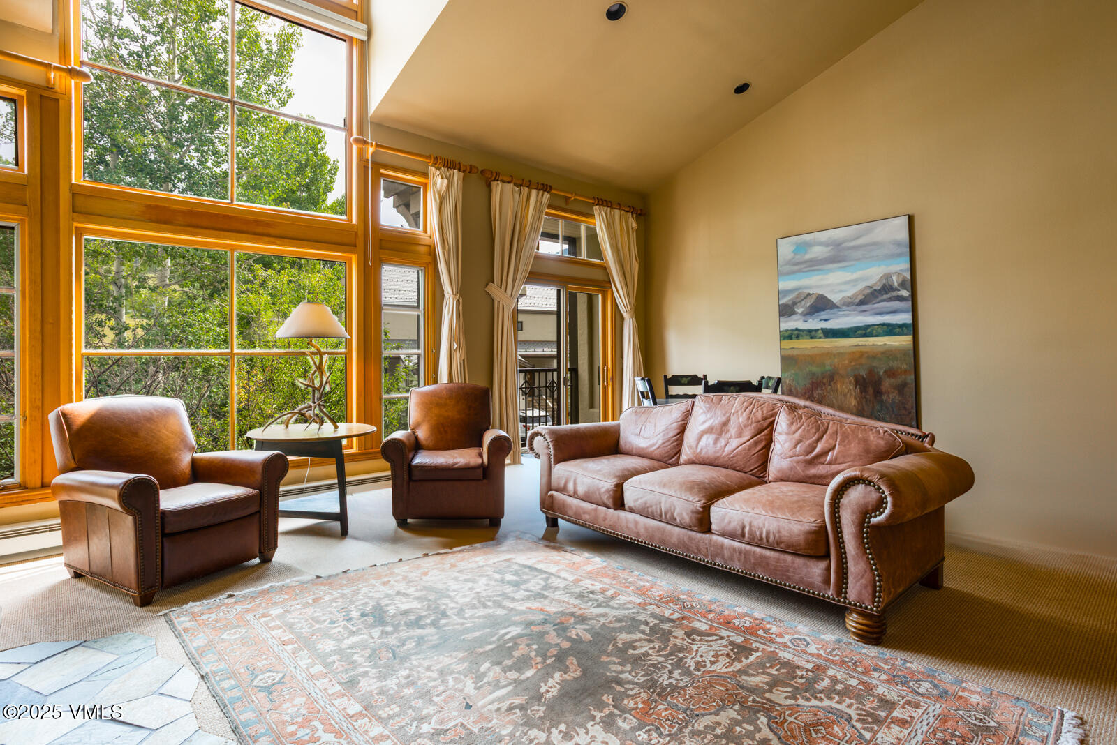 380 Offerson Road, Unit K2 Beaver Creek, CO 81620 - Photo 4 of 40 a living room with furniture and a large window