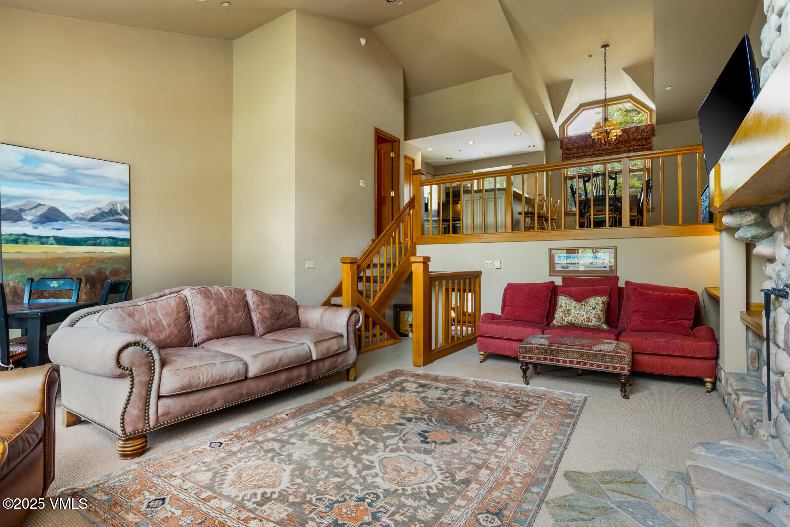 380 Offerson Road, Unit K2 Beaver Creek, CO 81620 - Photo 5 of 40 a living room with furniture and a flat screen tv