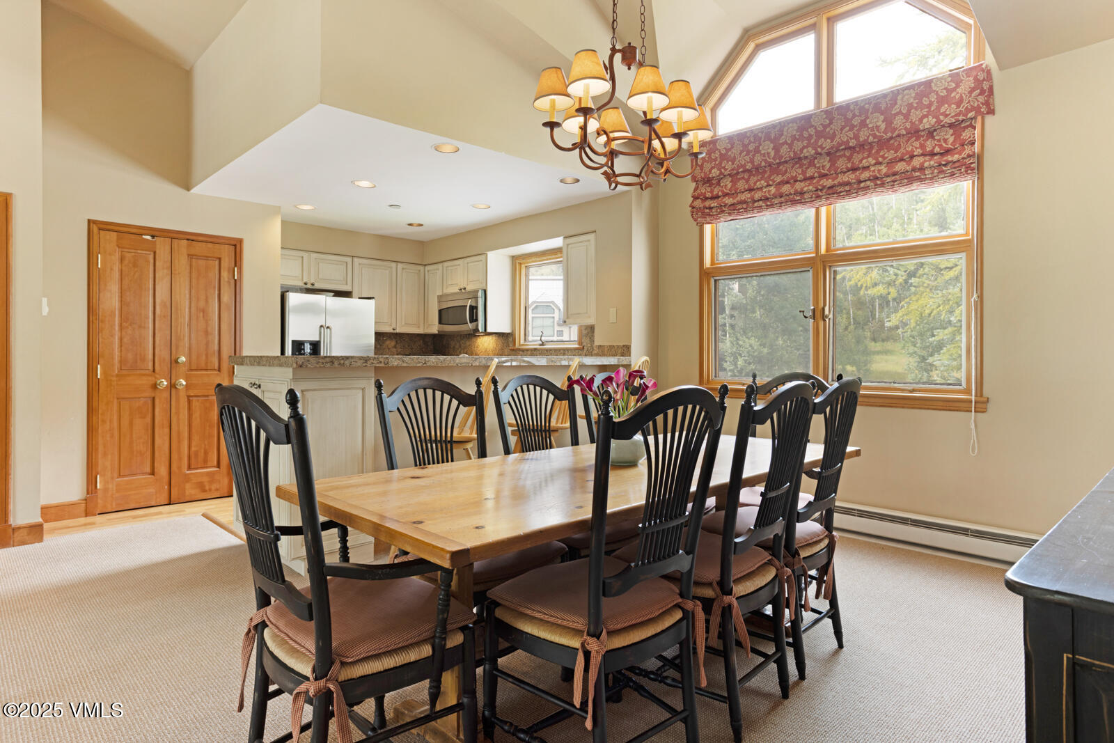 380 Offerson Road, Unit K2 Beaver Creek, CO 81620 - Photo 9 of 40 a view of a dining room with furniture window and outside view