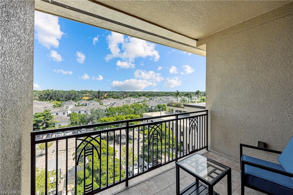 9115 Strada Place, Unit 5511 Naples, FL 34108 - Photo 21 of 38 a view of a city from a balcony