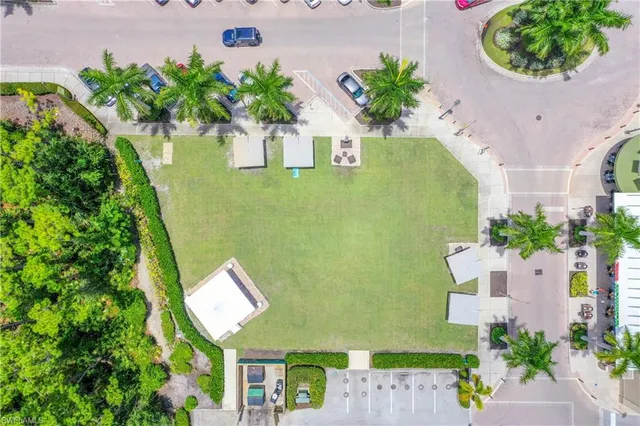 an aerial view of a house with garden space and plants