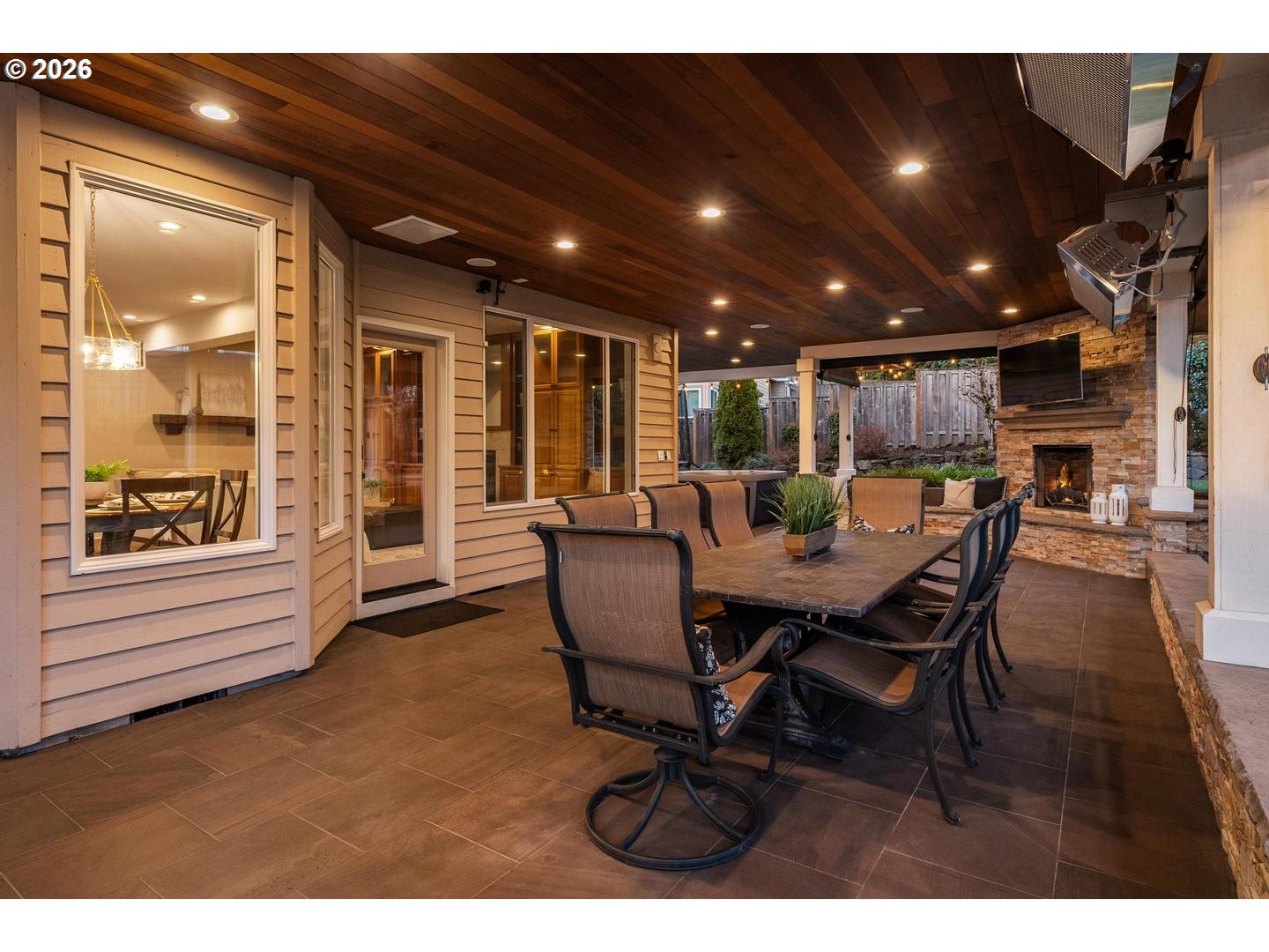 12352 Northwest Hibbard Drive Portland, OR 97229 - Photo 41 of 48 a view of a dining room with furniture window and outside view